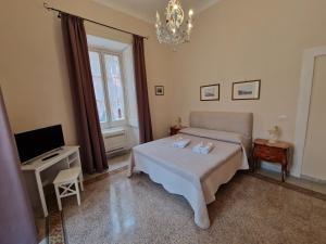 A television and/or entertainment centre at B&B IL CEDRO