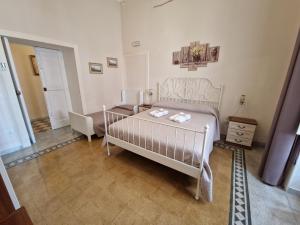 A bed or beds in a room at B&B IL CEDRO