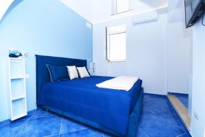Postel nebo postele na pokoji v ubytování Blue View Luxury Rooms