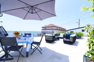 Posezení v ubytování Blue View Luxury Rooms