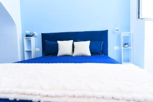 Postel nebo postele na pokoji v ubytování Blue View Luxury Rooms