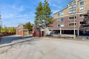 an empty street in front of a building at 250 Ski Hill Rd # 16 in Breckenridge