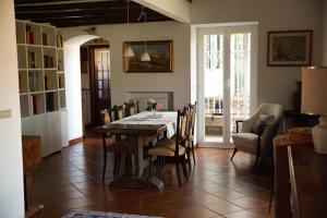 a dining room with a table and chairs at Sunrise in Rapallo