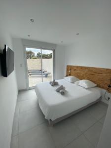 Ένα ή περισσότερα κρεβάτια σε δωμάτιο στο Villa Santa Giulia