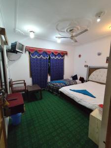 Letto o letti in una camera di Hotel New Heaven Canal