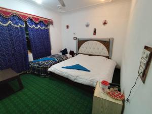 Letto o letti in una camera di Hotel New Heaven Canal