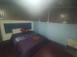 Letto o letti in una camera di Hotel New Heaven Canal