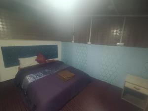 Letto o letti in una camera di Hotel New Heaven Canal