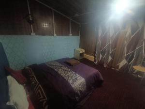Letto o letti in una camera di Hotel New Heaven Canal