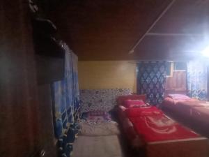 Letto o letti in una camera di Hotel New Heaven Canal