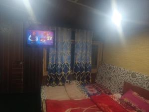 Letto o letti in una camera di Hotel New Heaven Canal