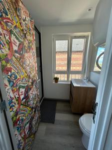 Koupelna v ubytování Appartement vue mer. + 6 fotografií