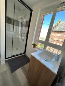 Kúpeľňa v ubytovaní Appartement vue mer.