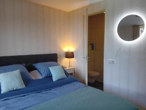 Postel nebo postele na pokoji v ubytování Bed & Breakfast in ons Bakhuis