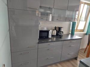 Kuchyňa alebo kuchynka v ubytovaní Wohnung mit Charme in Pinsdorf