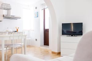 TV a/nebo společenská místnost v ubytování Zangara Flat