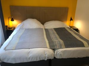 Cama ou camas em um quarto em MAISON SAINT CHARLES