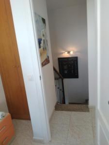 TV a/nebo společenská místnost v ubytování Atico Duplex 1ª