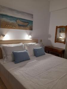 Postel nebo postele na pokoji v ubytování Lilian Beachfront Apartments
