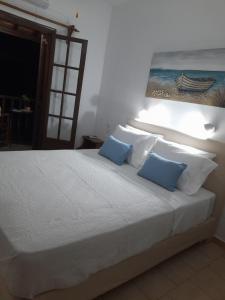 Postel nebo postele na pokoji v ubytování Lilian Beachfront Apartments