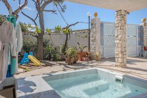 Piscina di Extravacanza Polignano a Mare o nelle vicinanze