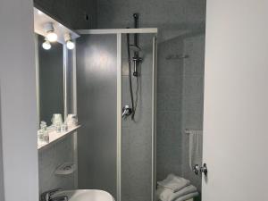Koupelna v ubytování Hotel Conte