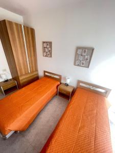 Postel nebo postele na pokoji v ubytování Sea view apartment in Caorle + 33 fotografií