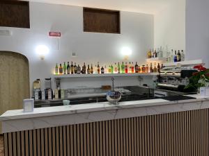 Nápoje v ubytování Hotel Conte