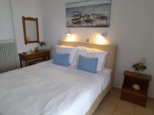 Postel nebo postele na pokoji v ubytování Lilian Beachfront Apartments