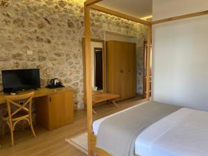 TV a/nebo společenská místnost v ubytování Valta Hotel + 14 fotografií
