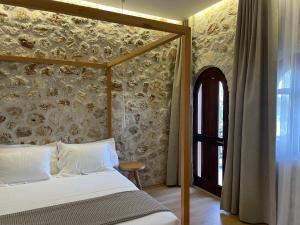 Letto o letti in una camera di Valta Hotel
