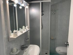 Koupelna v ubytování Hotel Conte