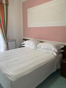 Postel nebo postele na pokoji v ubytování Hotel Conte