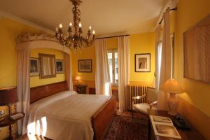Кровать или кровати в номере Castrum di Serravalle