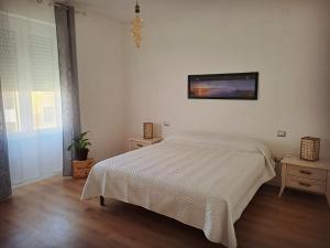 Postel nebo postele na pokoji v ubytování Asfodelo Home