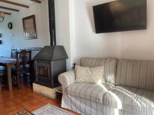 Posedenie v ubytovaní PRECIOSO CHALET JUNTO A POTES CON PISCINA-4 Hab,3 Baños