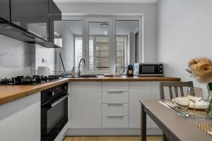 Kuchyň nebo kuchyňský kout v ubytování Warsaw Central Studio - Balcony, Top Location - by Rentujemy