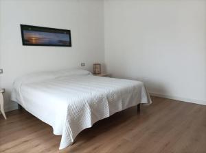 Postel nebo postele na pokoji v ubytování Asfodelo Home