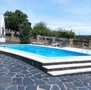 Der Swimmingpool an oder in der Nähe von Villamia