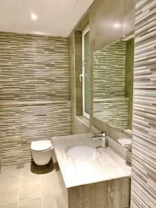 Koupelna v ubytování Iveria Hotel Apartments