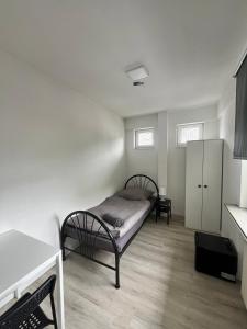 Letto o letti in una camera di Wohnung für Monteure (Einzelzimmer / Doppelzimmer) in der Nähe von Köln/Bonn/Hennef/Waldbröl