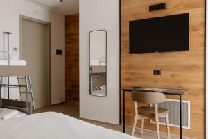 TV a/nebo společenská místnost v ubytování Belladonna Hotel