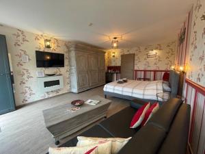 Postel nebo postele na pokoji v ubytování B&B Le Bouchat-Oreille