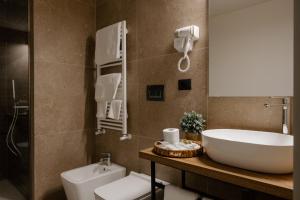 Koupelna v ubytování Belladonna Hotel