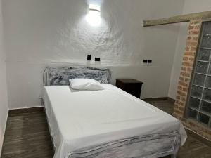 Casa Encanto Buga客房内的一张或多张床位