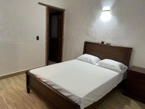 Casa Encanto Buga客房内的一张或多张床位