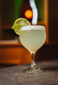 a margarita with a lime in a glass at Welbeck Hotel & Apartments in Douglas