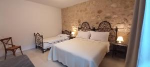 Postel nebo postele na pokoji v ubytování B&B Casa Anaceta