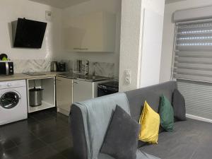 Kuchyňa alebo kuchynka v ubytovaní GK2night, appartement avec parking sous sol gratuit
