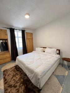 Posteľ alebo postele v izbe v ubytovaní Urban Haven Rooms